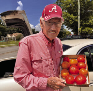 Tomato Man sells fresh tomatoes from his car