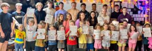 Kindergartners receive handmade coloring books
