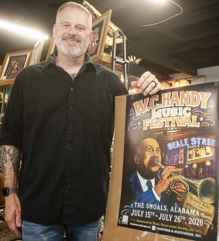 Music helps drive Handy poster artist